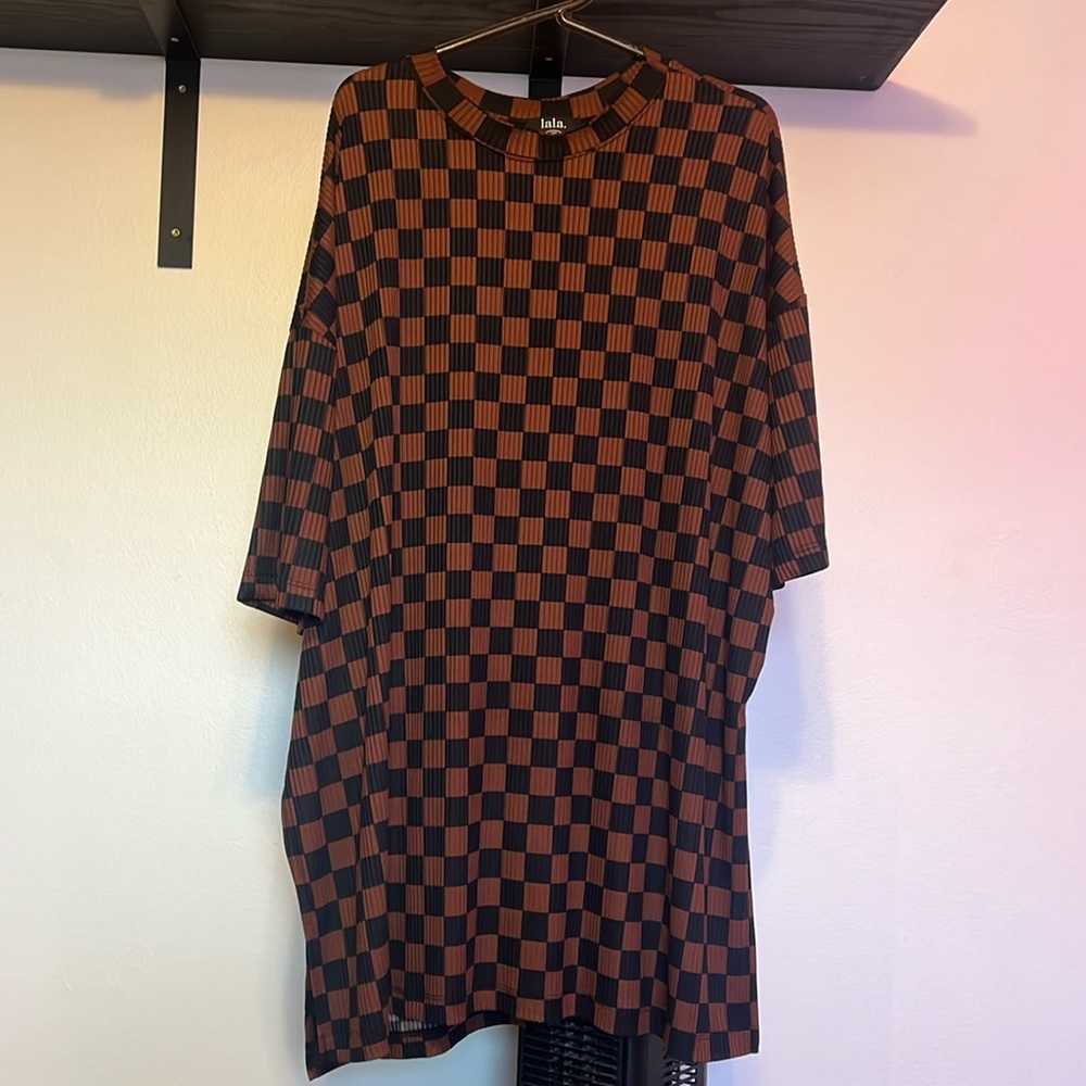 Dressed in LALA checkered oversized tunic